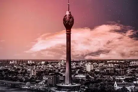 The Lotus Tower rising above the Colombo skyline at dusk