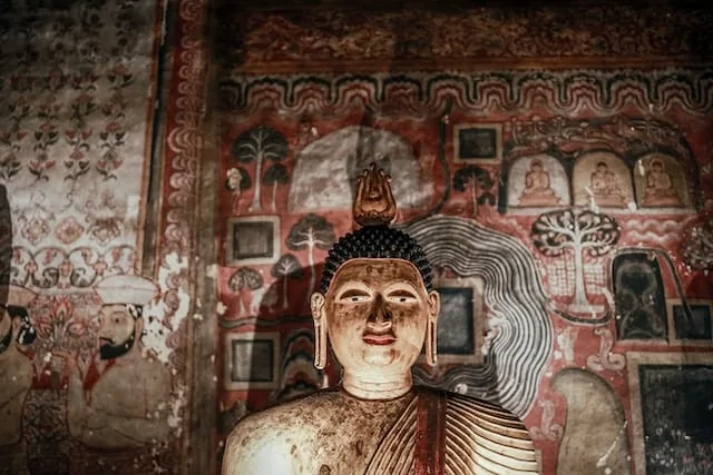 Painted Buddha statue inside the Dambulla cave temple